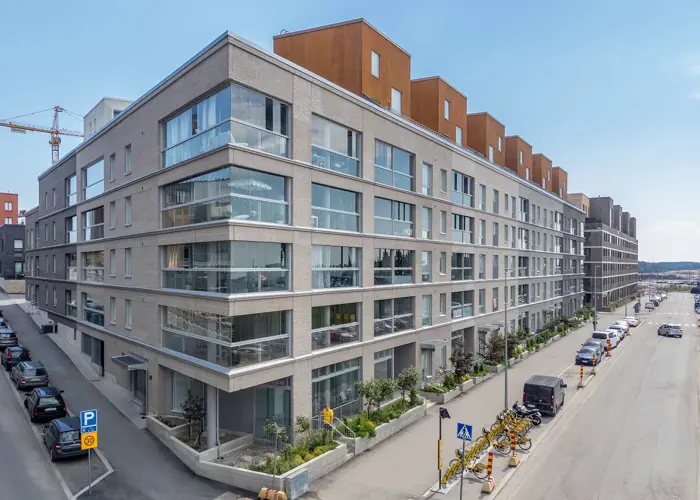 Hartelan rakentaman kerrostalon julkisivukuva Helsingin Kruunuvuorenrannassa.